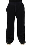 Dolce & Gabbana black viscose jogger sweatpants with drawstring waist, relaxed fit, and stylish men's loungewear.