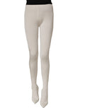 Dolce & Gabbana white high heels pumps paired with black jersey tights, stylish Italian footwear for women.