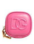 Dolce & Gabbana pink calf leather multifunctional kit bag with DG logo, featuring multiple compartments and sleek design.