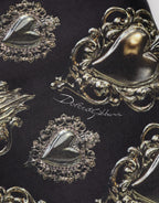 Dolce & Gabbana black Sacred Heart cotton sweatshirt with graphic print and ribbed cuffs and hem.