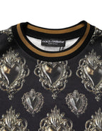 Dolce & Gabbana black Sacred Heart cotton sweatshirt with graphic print and ribbed cuffs, casual and stylish for everyday wear.