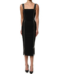 Dolce & Gabbana black sleeveless midi dress with front zipper detail, stylish and form-fitting for elegant occasions.