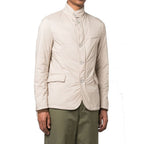 Herno beige polyamide full-length jacket displayed, featuring a sleek design with a high collar and zip closure.