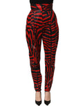 Dolce & Gabbana red and black zebra print high-waist cotton pants shown on a model.