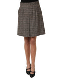 Dolce & Gabbana brown tweed high-waist A-line mini skirt with classic tailored design and textured fabric.