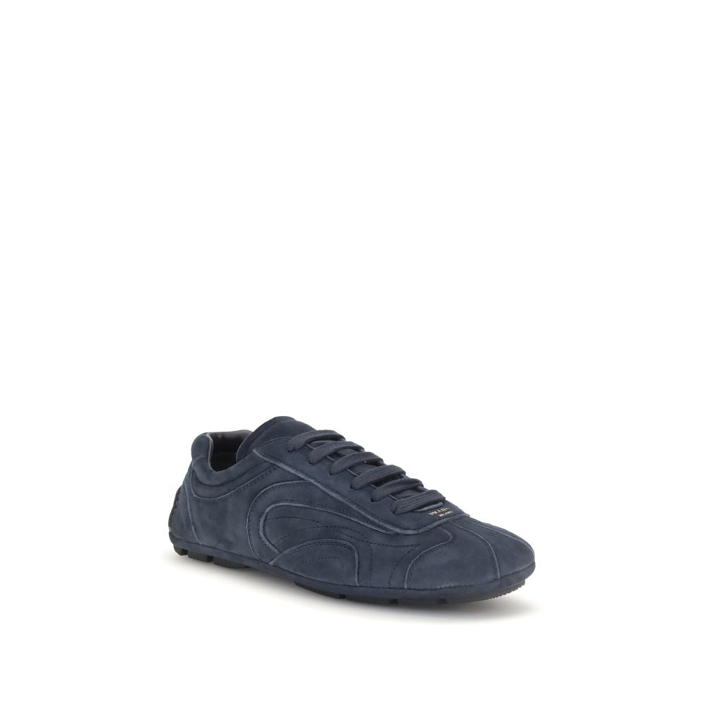 Prada Blue Calf Leather Bos Taurus athletic sneakers with white rubber soles and detailed stitching.