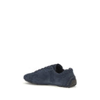 Prada Blue Calf Leather Bos Taurus athletic sneakers with sleek design and white rubber soles.
