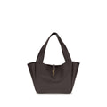 Saint Laurent Bos Taurus shoulder bag in brown calf leather with gold-tone hardware and adjustable strap on a plain background.