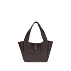 Saint Laurent Bos Taurus shoulder bag in brown calf leather with gold-tone hardware and adjustable strap on a plain background.