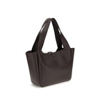 Saint Laurent Bos Taurus shoulder bag made of brown calf leather with sleek design and gold-tone hardware.