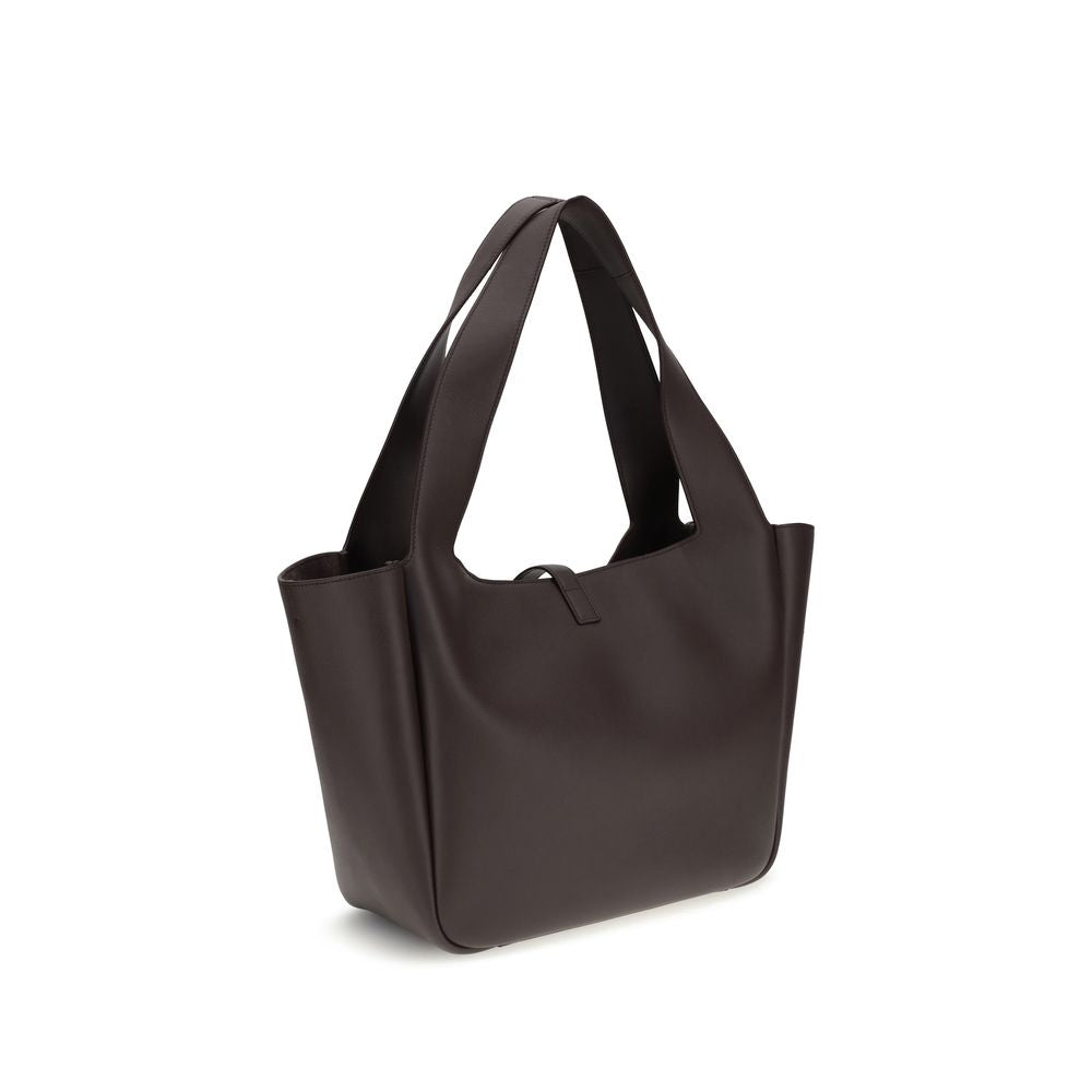 Saint Laurent Bos Taurus shoulder bag made of brown calf leather with sleek design and gold-tone hardware.