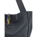 Saint Laurent Bos Taurus shoulder bag made of black calf leather with gold-tone hardware and structured design.