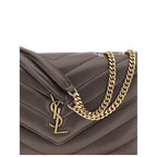 Saint Laurent gray lamb leather Ovis Aries shoulder bag with silver hardware and structured design on a plain background.