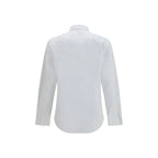 White cotton dress shirt by Burberry with a classic collar and button-down front, displayed on a hanger.