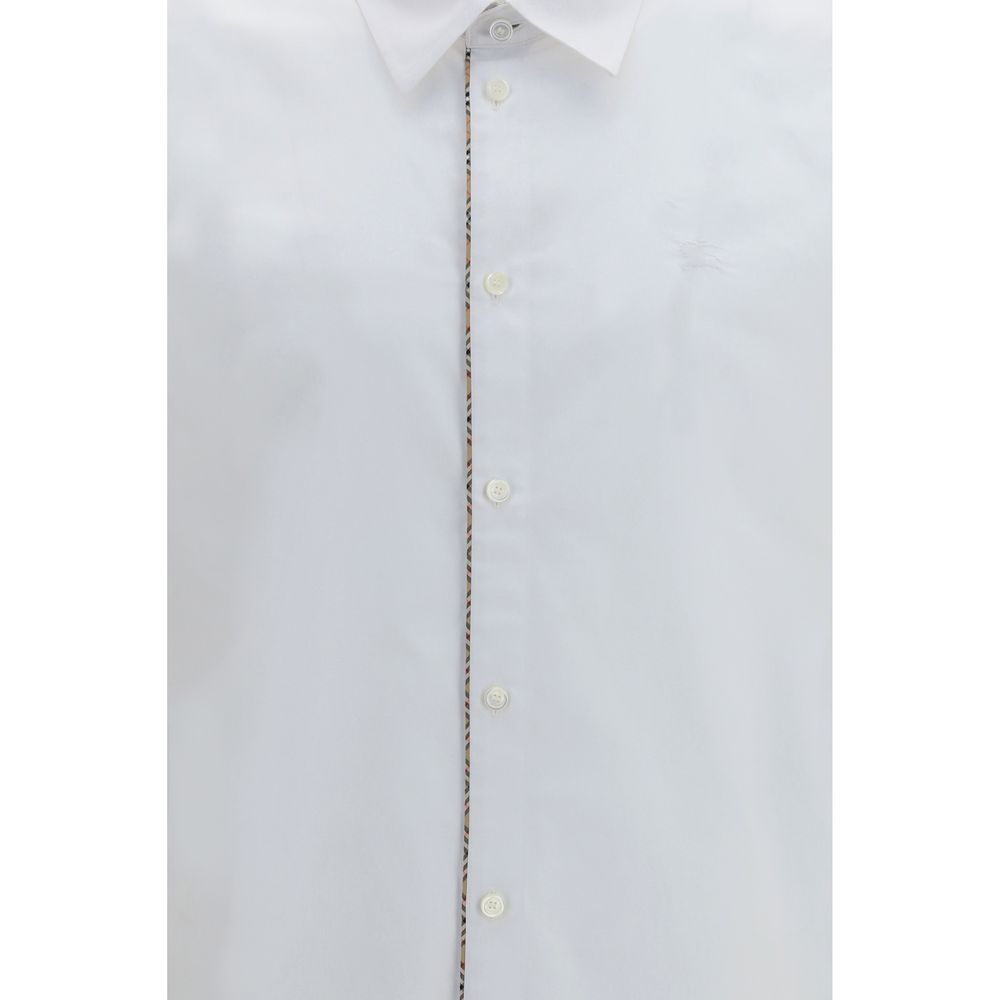 White cotton dress shirt by Burberry with classic collar and button-down front, displayed on a plain background.