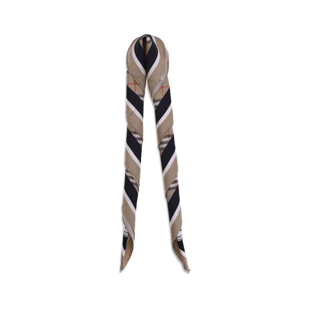 Burberry beige silk scarf featuring classic design and soft, luxurious fabric, displayed flat in the image.