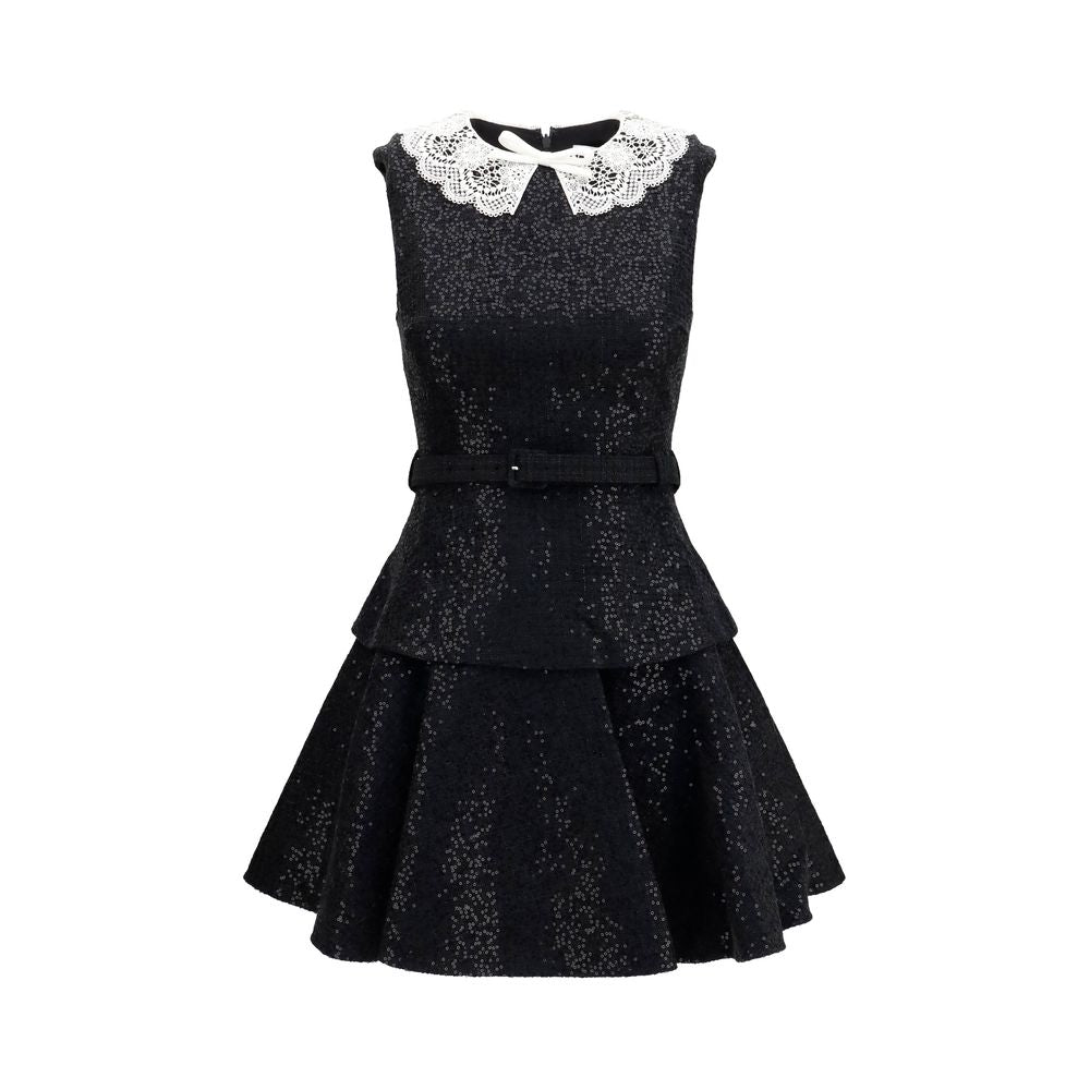 Self-Portrait black polyester casual dress displayed on a model, featuring a sleek, modern design perfect for everyday wear.