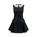 Self-Portrait black polyester casual dress displayed on a model, featuring a sleek, modern design perfect for everyday wear.