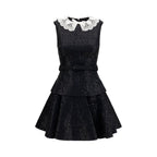 Self-Portrait black polyester casual dress displayed on a model, featuring a sleek, modern design perfect for everyday wear.