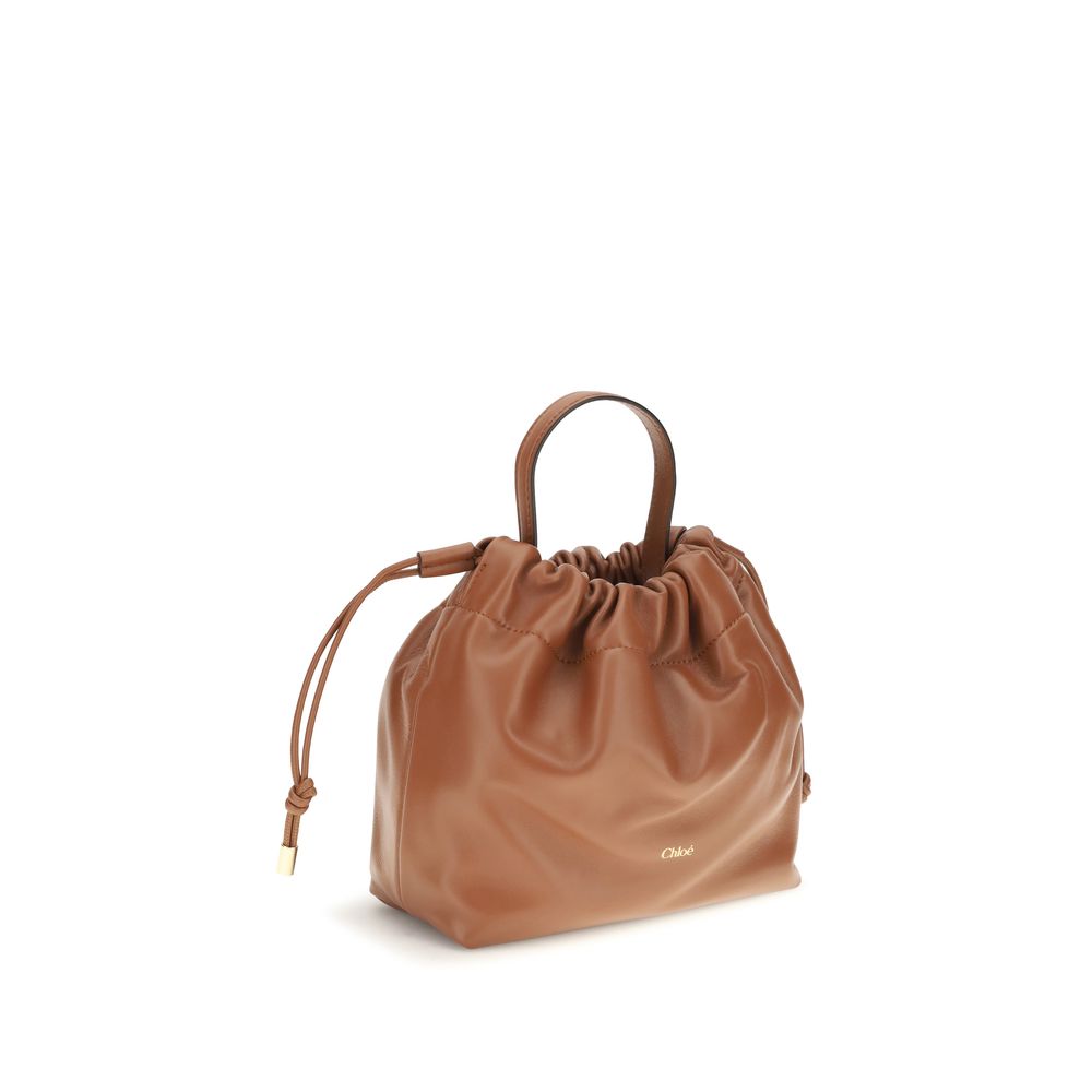 Chloé brown lamb leather Ovis Aries shoulder bag with top handle and subtle stitching details.