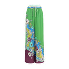 Alemais multicolor silk casual pants with a relaxed fit and vibrant pattern, showcasing soft, luxurious fabric and stylish design.