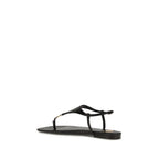 Saint Laurent Black Calf Leather Bos Taurus Flat Sandals with open toe and ankle strap, stylish and comfortable for warm weather.