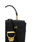 Black calf leather Coccinelle Bos Taurus shoulder bag with sleek design and silver hardware.