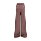 Rick Owens brown silk casual pants laid flat, showcasing their relaxed fit and smooth fabric texture.