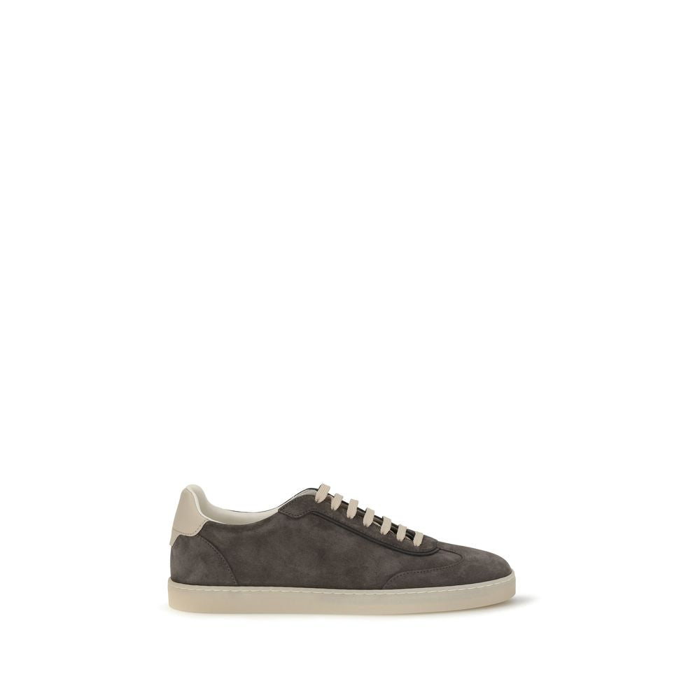 Gray calf leather Brunello Cucinelli Bos Taurus low top sneakers with white rubber soles and subtle branding.