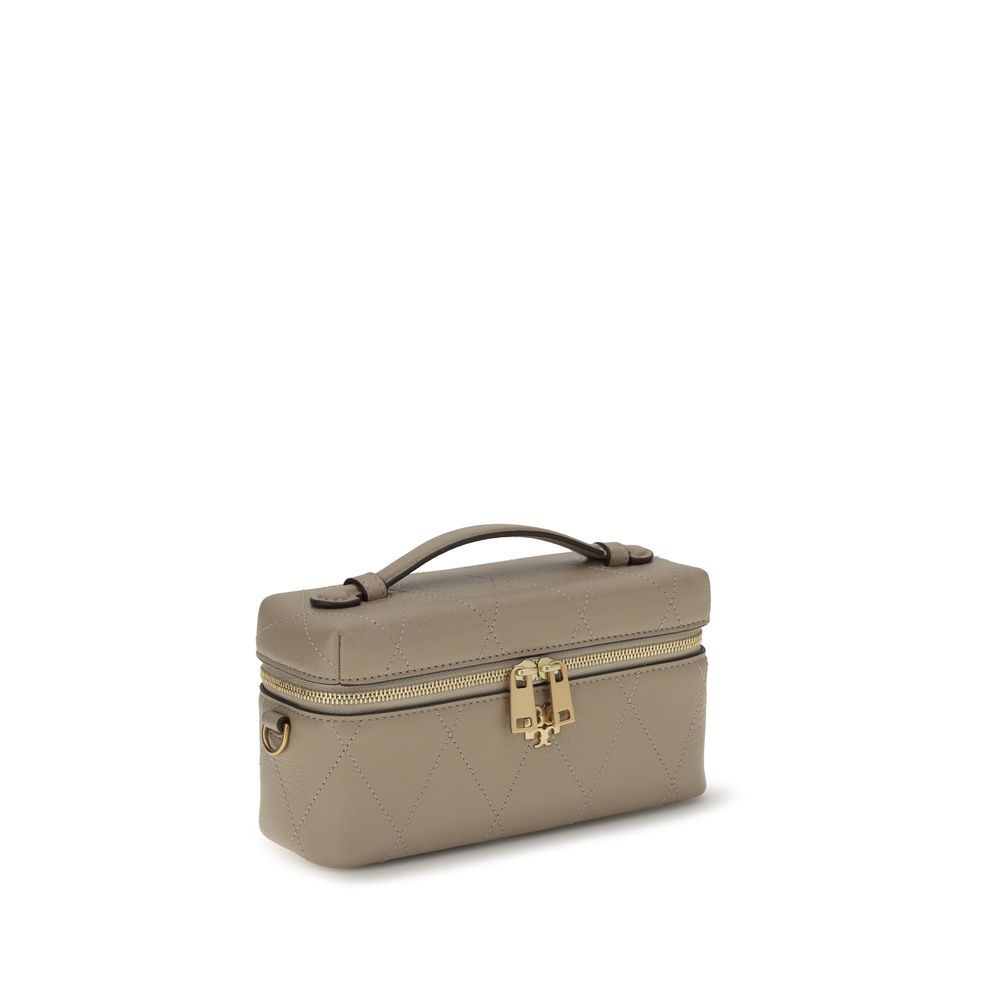 Gray Tory Burch Bos Taurus wallet made of calf leather with a sleek, compact design and subtle logo detailing.
