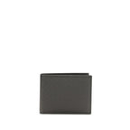 Ferragamo black calf leather Bos Taurus wallet with sleek design and subtle branding, showcasing fine craftsmanship and smooth texture.