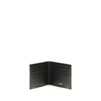 Ferragamo black calf leather Bos Taurus wallet showing sleek design and gold accents on the front.