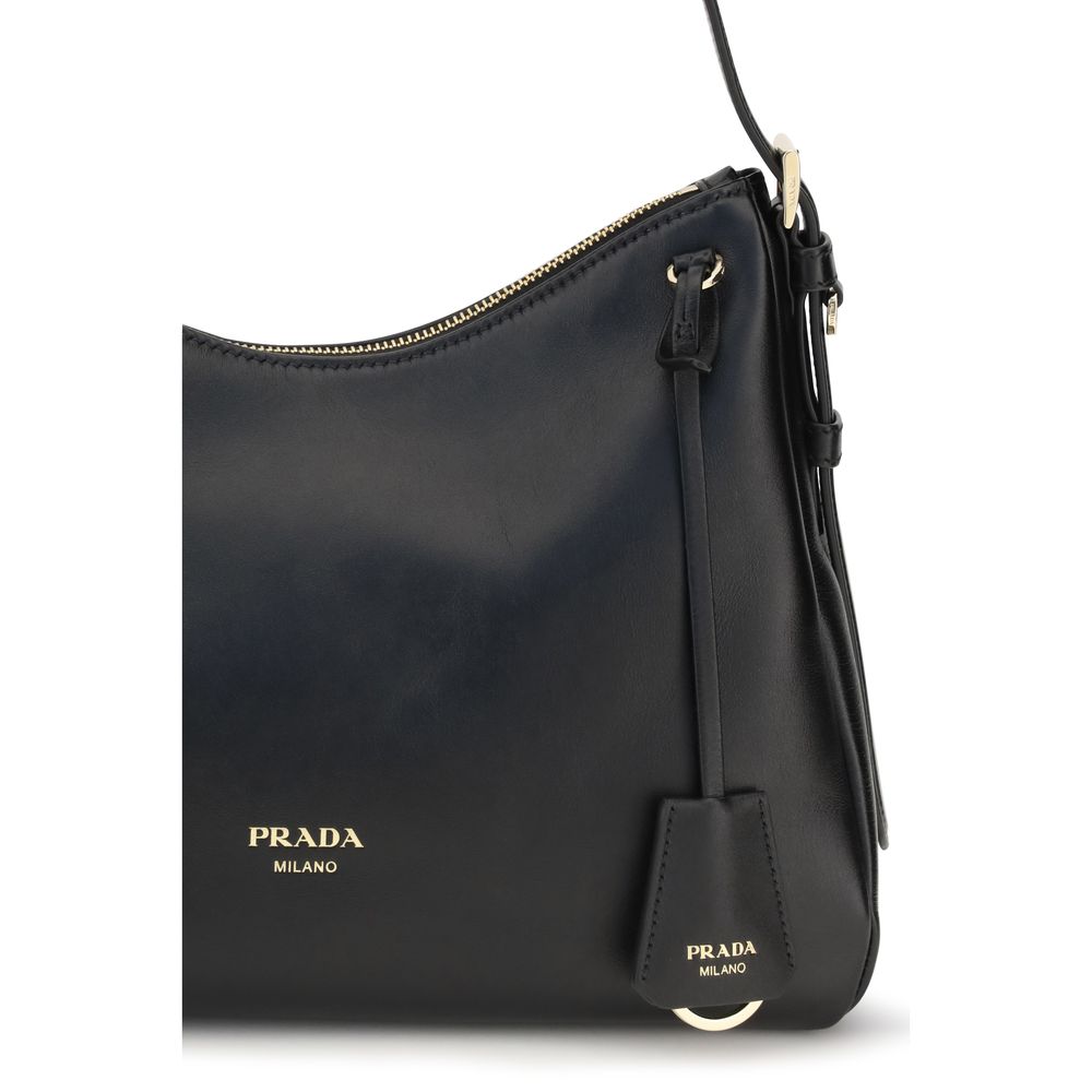 Prada Black Calf Leather Bos Taurus Shoulder Bag with sleek design and silver hardware, showcasing its elegant craftsmanship.
