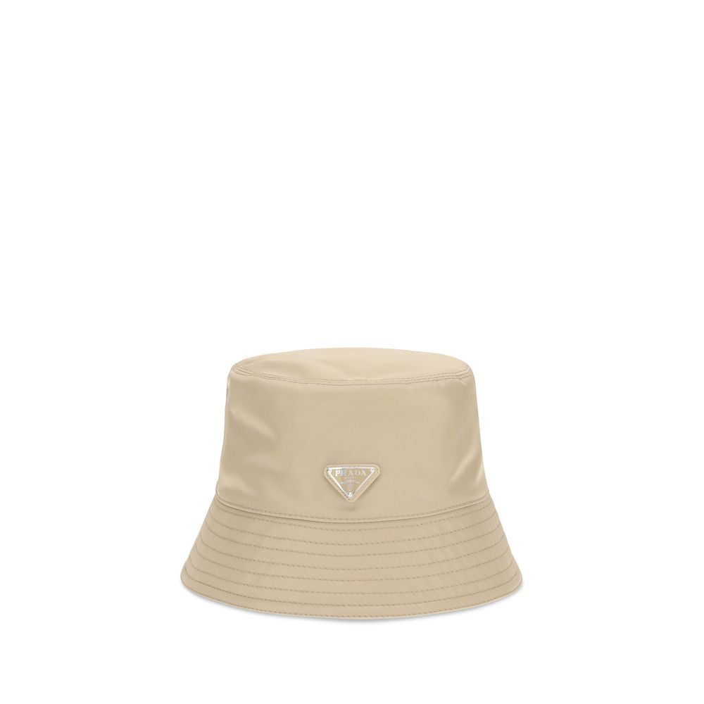 Prada beige polyamide bucket hat with wide brim and adjustable chin strap, stylish men's accessory.