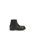 Black calf leather MM6 Bos Taurus Chelsea boots with elastic side panels and sleek design, displayed on a neutral background.