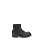 Black calf leather MM6 Bos Taurus Chelsea boots with elastic side panels and sleek design, displayed on a neutral background.