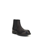 Black calf leather MM6 Bos Taurus Chelsea boots with elastic side panels and sleek design.