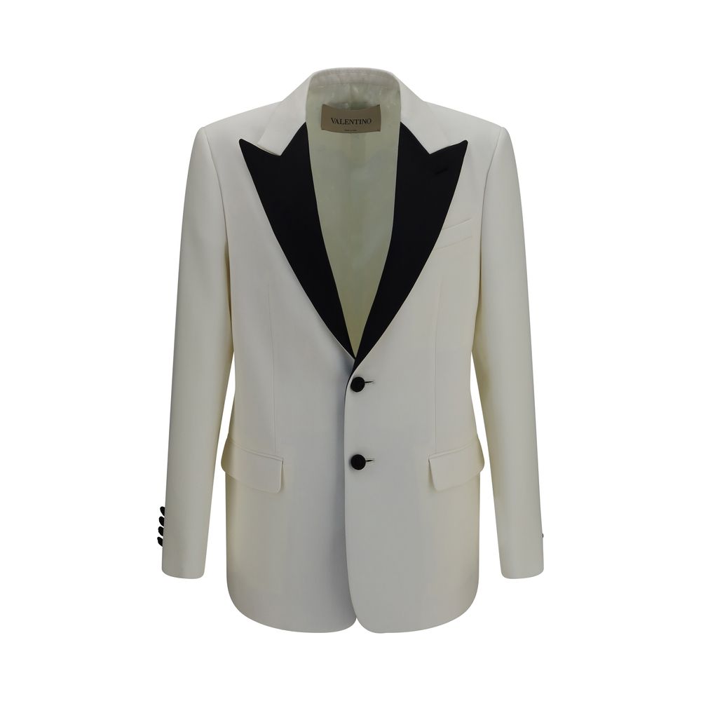Valentino Garavani white wool blazer with over Aries design, tailored fit, and classic lapels, displayed on a hanger.