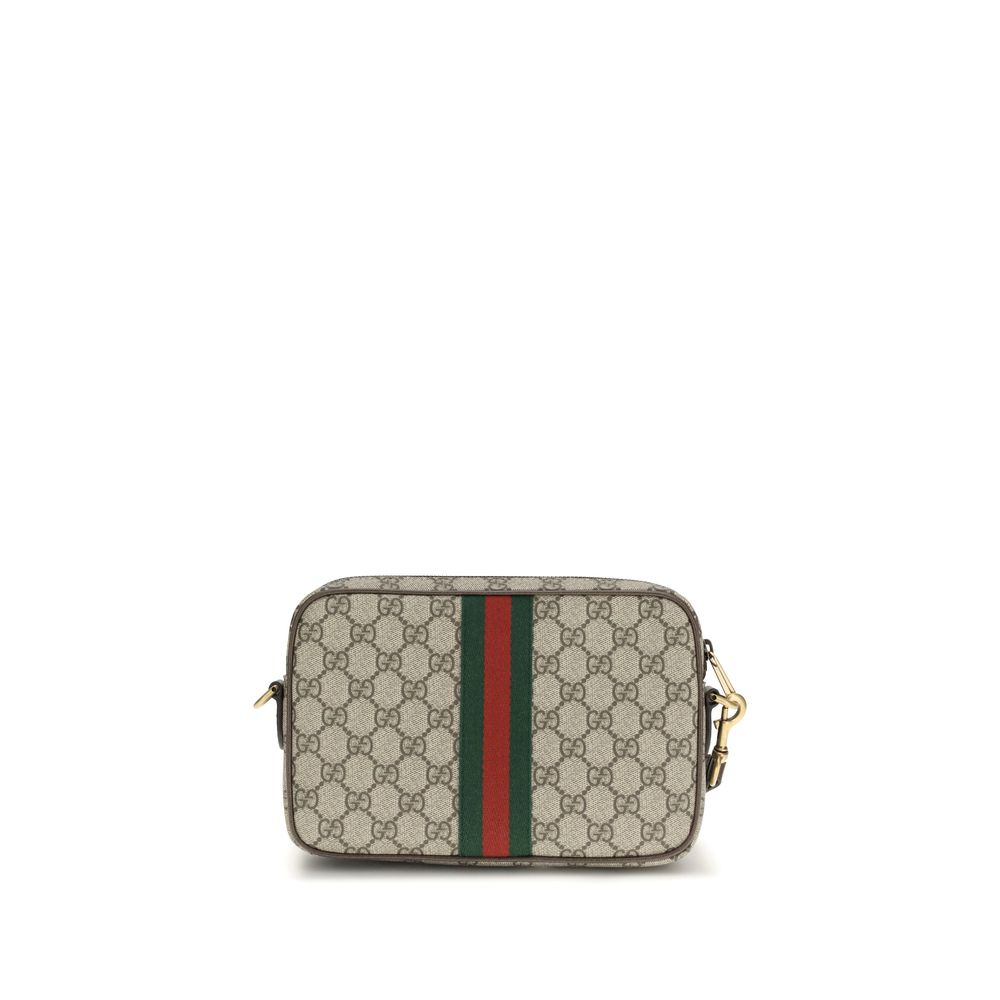 Gucci beige polyethylene shoulder bag with adjustable strap and minimalist design, showcasing a sleek, modern accessory.