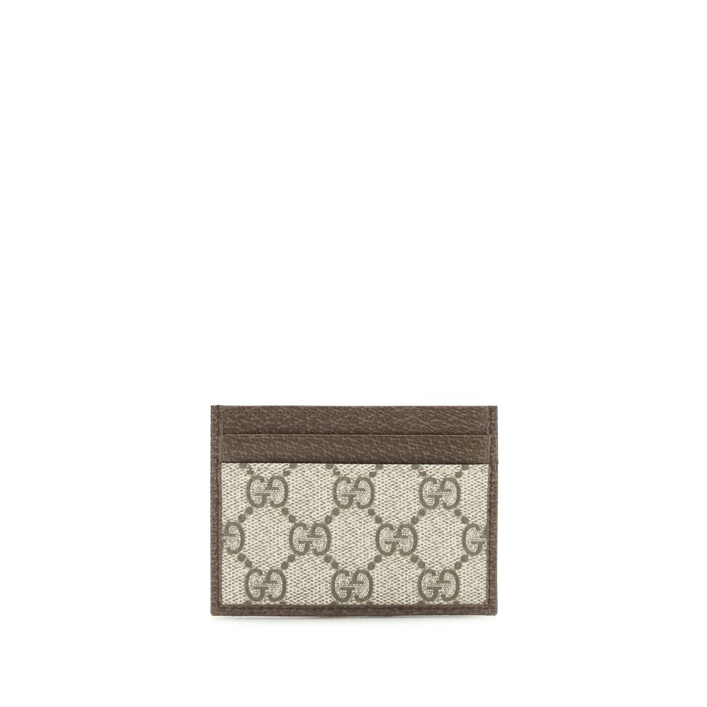 Gucci brown fabric wallet with stitched detailing and multiple card slots, compact and stylish for everyday use.
