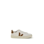 Veja white leather sneakers with clean design and white rubber soles, displayed on a plain background.
