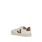 Veja white leather sneakers with clean design and white laces, showcasing a stylish casual footwear option.