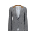 Tom Ford multicolor cashmere full-length jacket displayed on a hanger, showcasing luxurious fabric and vibrant pattern.