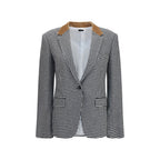 Tom Ford multicolor cashmere full-length jacket displayed on a hanger, showcasing luxurious fabric and vibrant pattern.
