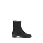 Maison Margiela Black Calf Leather Bos Taurus ankle boots with sleek design and pointed toes.