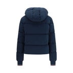 Thom Browne blue cotton full-length jacket displayed on a hanger, showcasing tailored design and classic style.