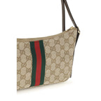 Gucci beige fabric shoulder bag with adjustable strap and gold-tone hardware, stylish accessory for everyday wear.