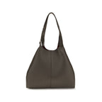 Brown calf leather Coccinelle Bos Taurus shoulder bag with sleek design and silver-tone hardware, featuring adjustable strap and zipper closure.