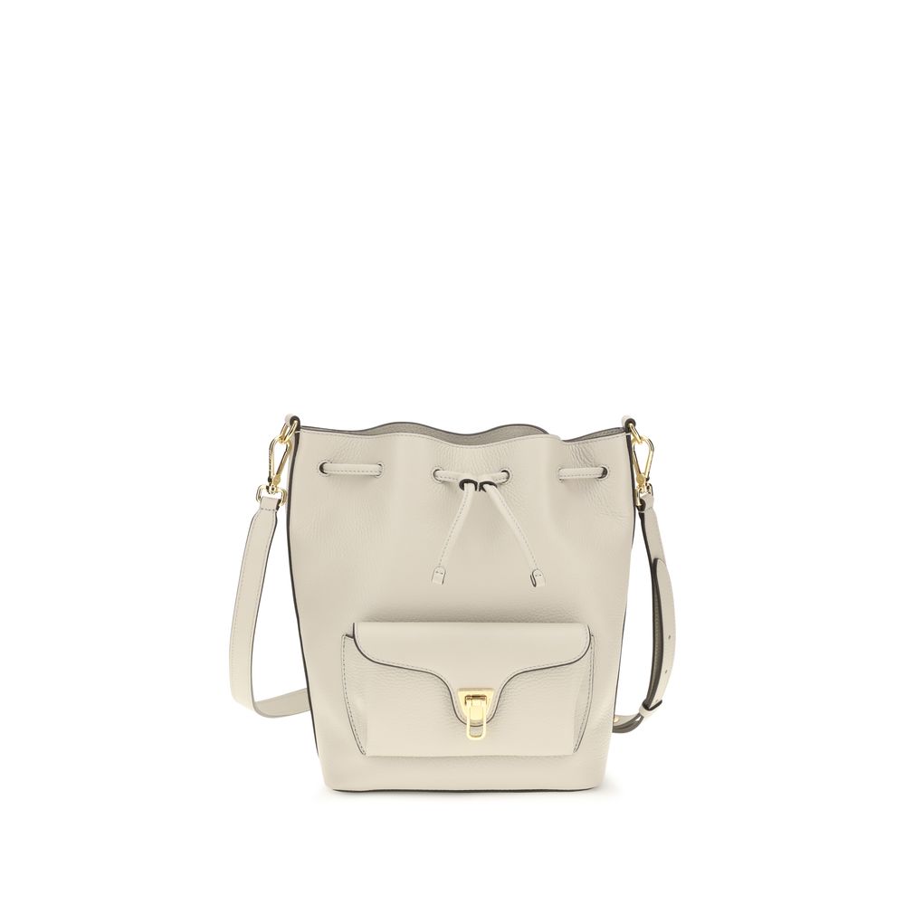 Coccinelle beige calf leather Bos Taurus backpack bag with silver hardware and adjustable straps, front flap pocket, and top handle.
