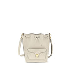 Coccinelle beige calf leather Bos Taurus backpack bag with silver hardware and adjustable straps, front flap pocket, and top handle.